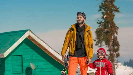 Father and child enjoying snowy activities